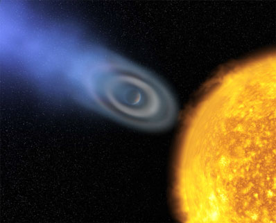 An artist's impression shows an extended ellipsoidal envelope of oxygen and carbon discovered around the extrasolar planet HD 209458b