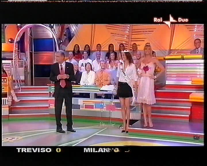 Simona Ventura wear white slip in a TV show 3