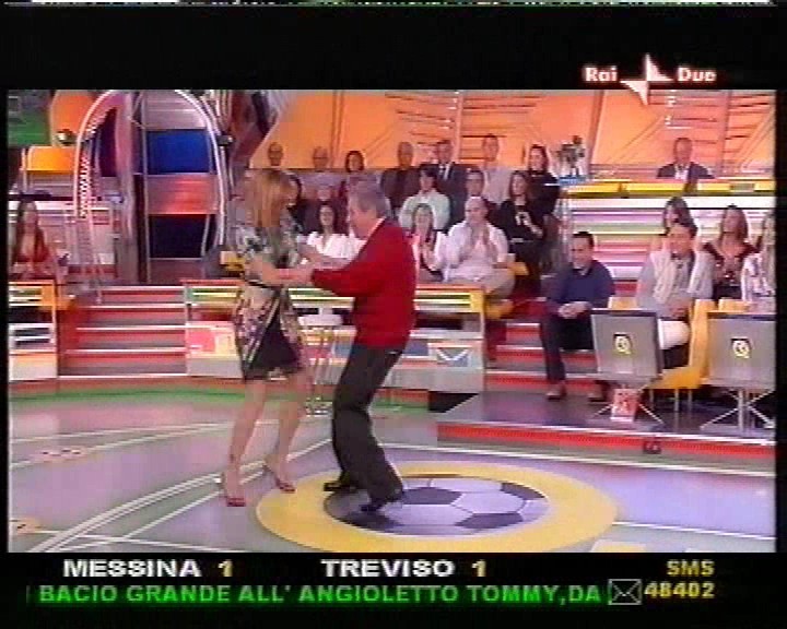 Simona Ventura wear black slip in a TV show 2