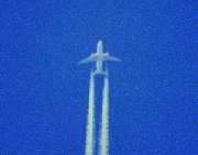 Airliner with trails