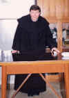 Padre Giuseppe (detto Gioe) Dall'Acqua durante una conferenza