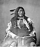 Slow-Bull-Oglala-1872-(note-Crow-style-shirt-possibly-captured-in-battle).jpg